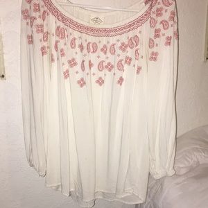 Off the sleeve shirt